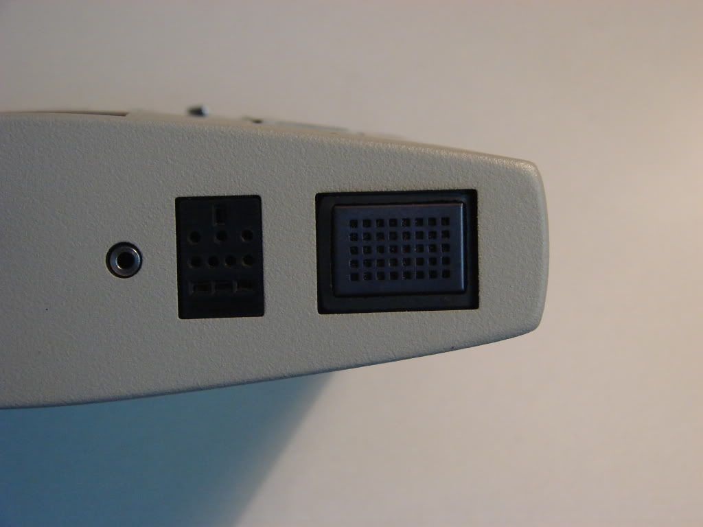 Closeup of the Microphone Connector, Proprietary Connector, and Microphone Closeup of the Microphone Connector, Proprietary Connector, and Microphone