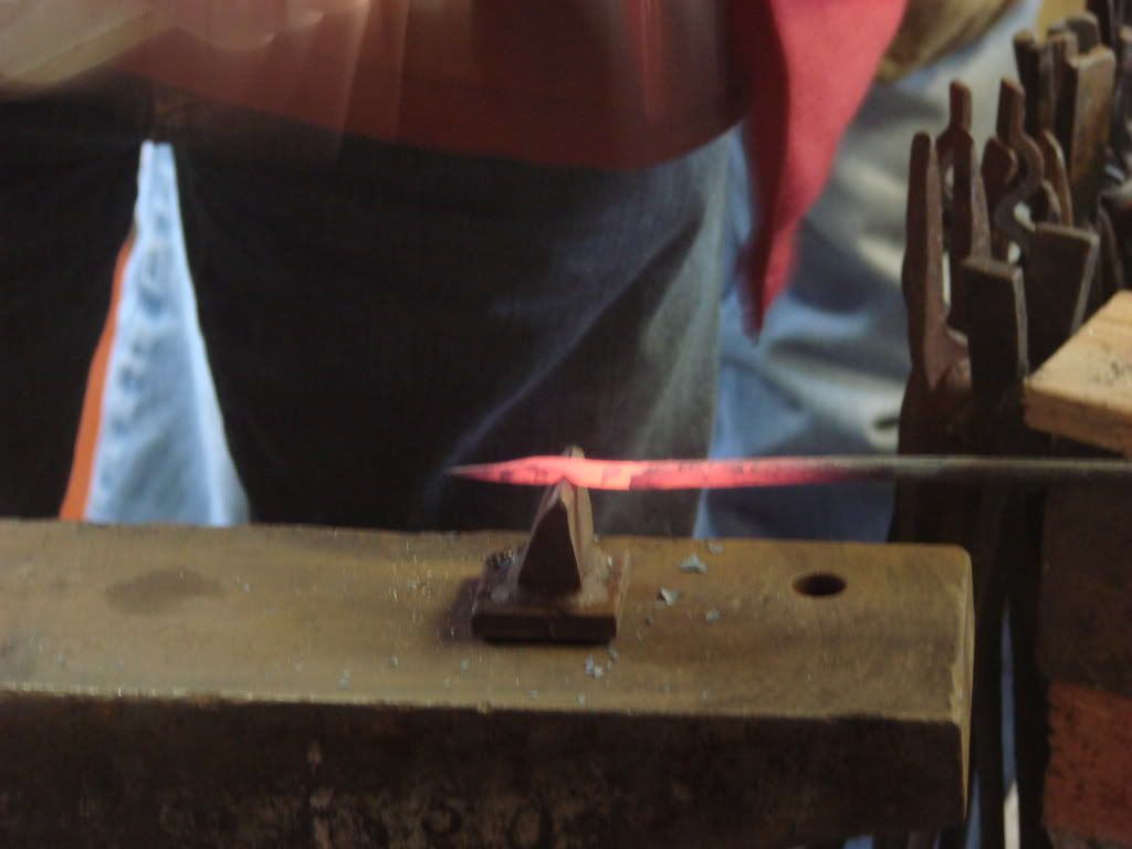 Cutting Through the Rod with a Hardy Cutter and Hammer Cutting Through the Rod with a Hardy Cutter and Hammer